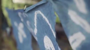 海南三亚槟榔谷扎染手工布料视频的预览图